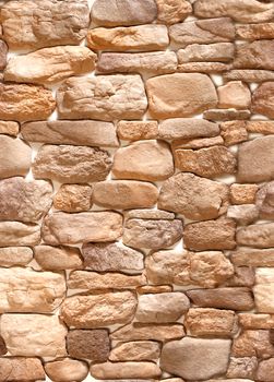 Decorative overlay stone in the form of coffee-colored cobblestones .Texture or background.