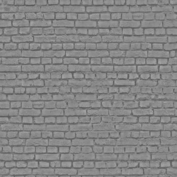 The abandoned house is made of dark gray bricks .Texture or background