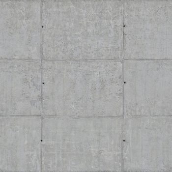 Concrete load-bearing wall with holes in the squares.Texture or background.