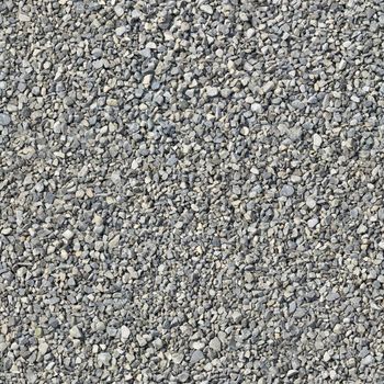 Fine gravel with sharp edges of gray color.Background or texture