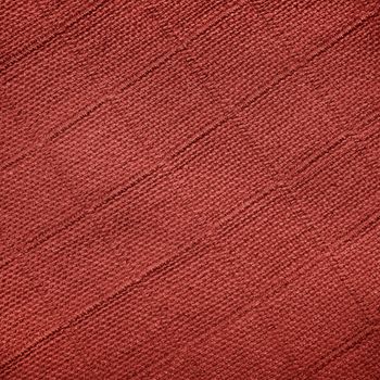 Fabric with a geometric pattern in the form of a square of Burgundy color.Texture or background