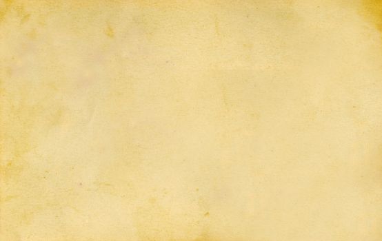 A sheet of time-worn paper with stains and streaks on the surface .Texture or background