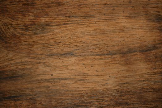The old wooden Board is brown with a rough texture and streaks on the surface .Texture or background