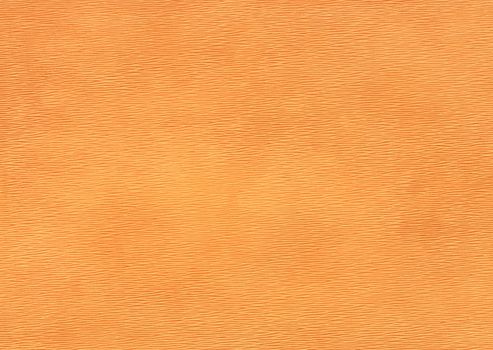 Orange colored paper with embossed diamond pattern.Texture or background