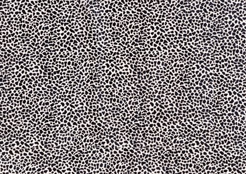 Short-haired fur with lots of black spots.Texture or background