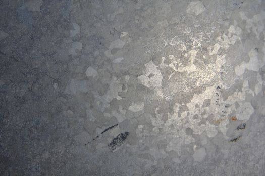 Abstract dark grey marble with a crack in the corner