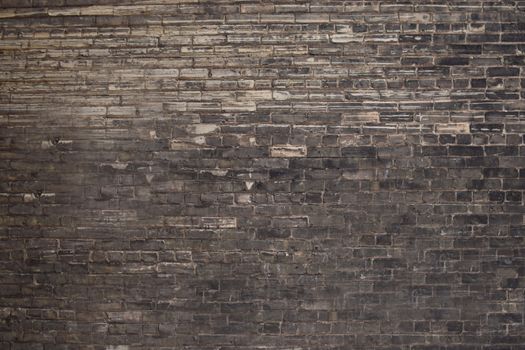 Brick wall texture with black and gray brick