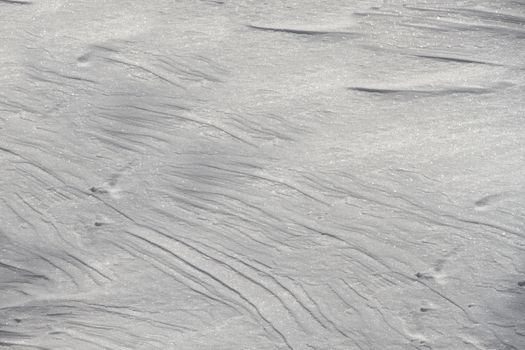 White snow in cold winter with crystallized surface