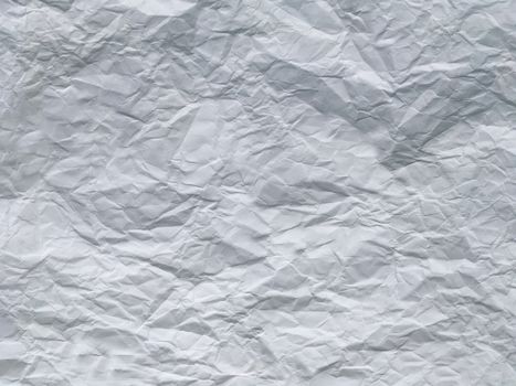 Crumpled sheet of white paper square shape.Texture or background