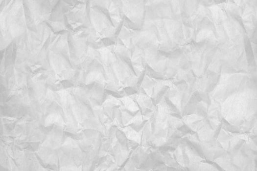 Heavily crumpled sheet of white paper.Texture or background