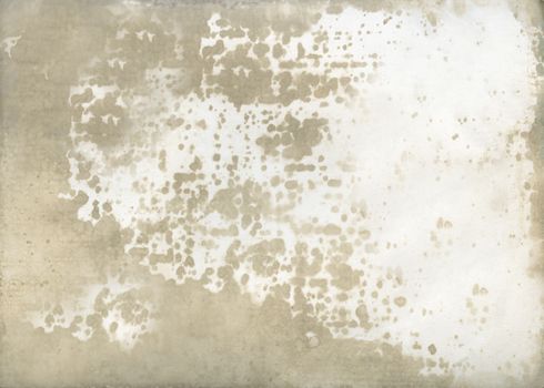 Time-aged beige paper with a moldy surface.Texture or background