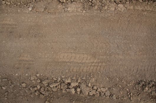 Tire tracks on dry sand.Texture or background