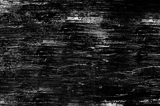 The scratched surface of the wall is black.Background or texture
