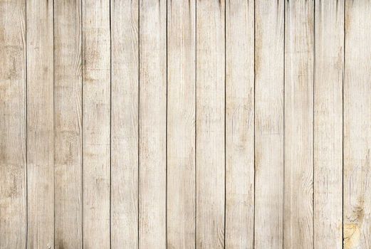 A light brown wooden Board is laid out vertically .Texture or background