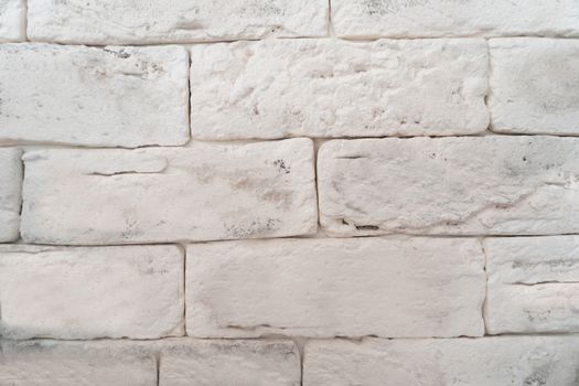 Square white brick wall .Texture or font