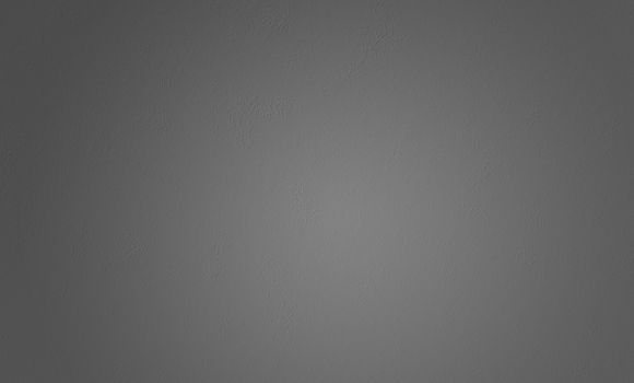 Dark grey textured wall surface. Texture or background