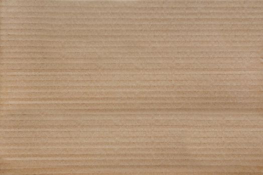 Textured brown cardboard as a background.Texture or background