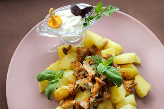 Slavic cuisine fried potatoes with fried mushrooms.Texture or background
