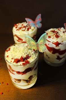 Strawberry ice cream is decorated with white chocolate shavings .Texture or background