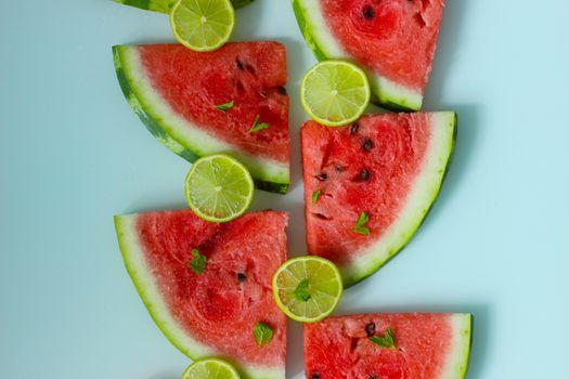 Lime with mint and slices of juicy watermelon.Texture or background