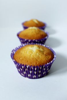 Three cupcakes home-made dessert for tea.Texture or background