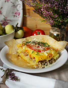 Baked casserole with minced meat under a cheese crust.Texture or background