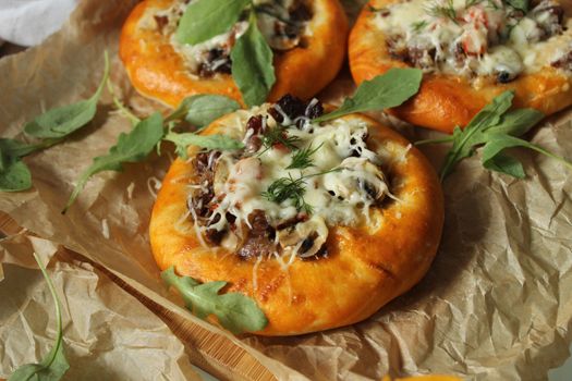 Homemade cakes with mushrooms and meat and sauce close-up.Texture or background