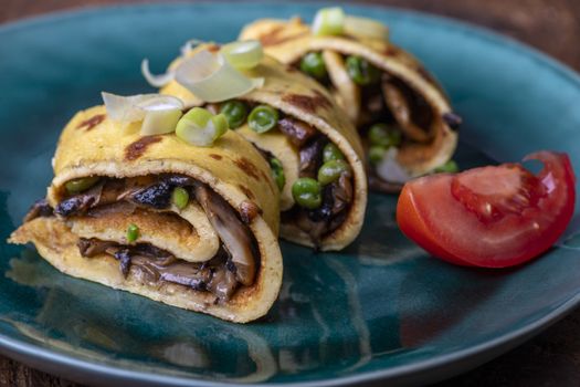 omelette with mushrooms on a plate