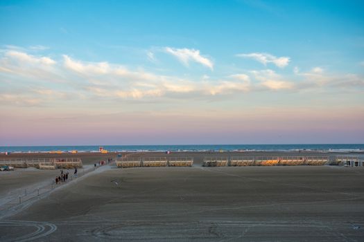 A View of the Massive Wildwood Beach With Metal Stadium Stands On It