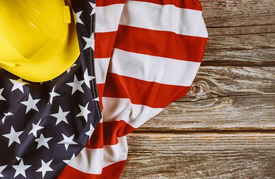 US. federal holiday of Labor Day is United States America of engineer yellow plastic construction helmet, american patriotic background