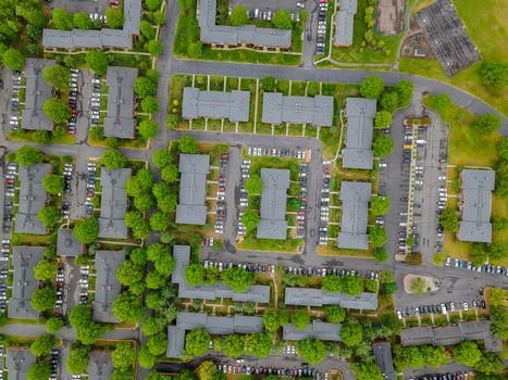 Stay home during the Covid-19 view of winding streets and roads in a residential area small town neighborhood with landscape roofs of houses