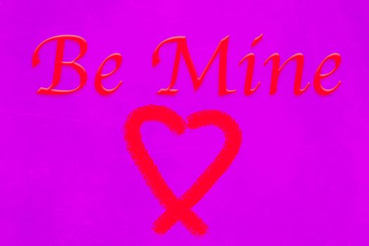 Be Mine red cursive text on purple background with red heart signifying romance