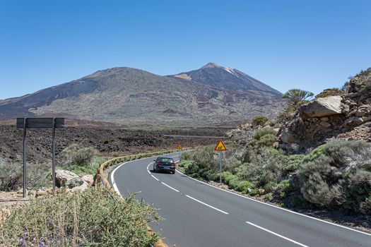 Tenerife island, Spain - 05/10/2018: Car rides on mountain road to Teide volcano
