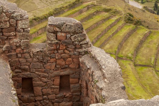 Pisac, Peru - April 4, 2014: Archaeological Park of Pisac, ruins and constructions of the ancient Inca city, near the Vilcanota river valley, Peru.