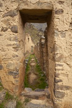 Ollantaytambo, Peru - April 4, 2014: Ollantaytambo Archaeological Site, Pinkuylluna ruins and constructions of ancient Incas, near the Vilcanota river valley, Peru.