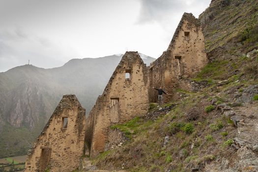 Ollantaytambo, Peru - April 4, 2014: Ollantaytambo Archaeological Site, Pinkuylluna ruins and constructions of ancient Incas, near the Vilcanota river valley, Peru.