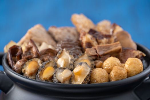 Traditional food of Chinese lunar new year, Buddha jumps over the wall, Chinese Soup Casserole dish, Buddha's Temptation, named Fo Tiao Qiang, close up.