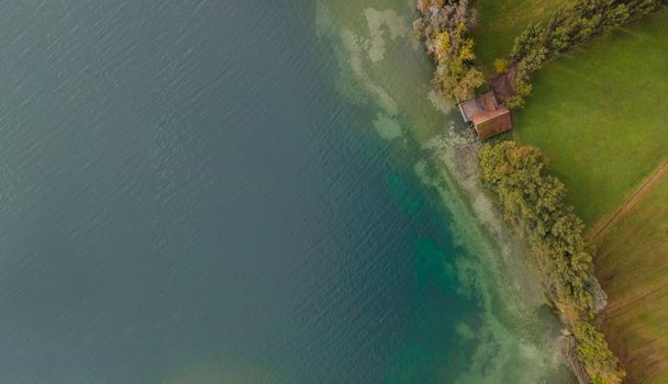 Drone shot over water. Background of lake. Birds view