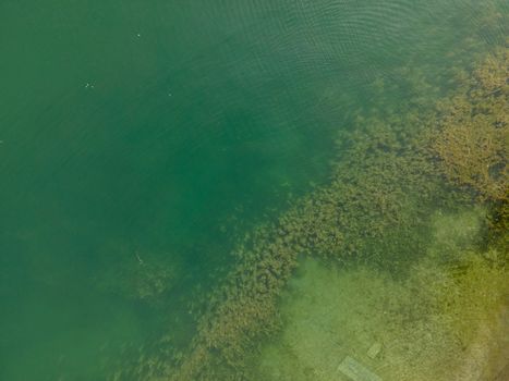 Drone shot over water. Background of lake. Birds view