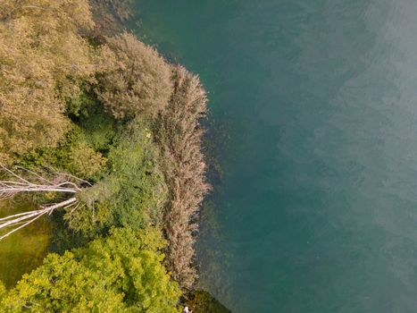 Drone shot over water. Background of lake. Birds view