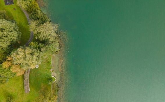 Drone shot over water. Background of lake. Birds view