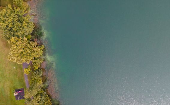 Drone shot over water. Background of lake. Birds view