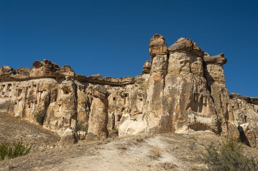 Detail of the ancient castle of Cavusin dug from a mountains, Cappadocia, Turkey