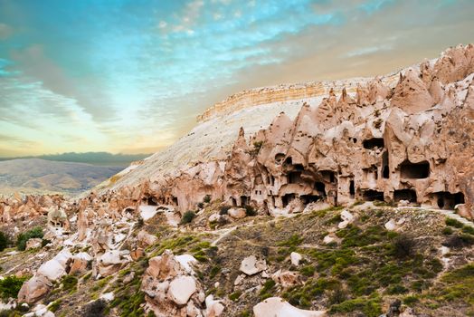 Spectacular teeth-like rock formation and old christian caves in Zelve Valley in Cappadocia, Turkey