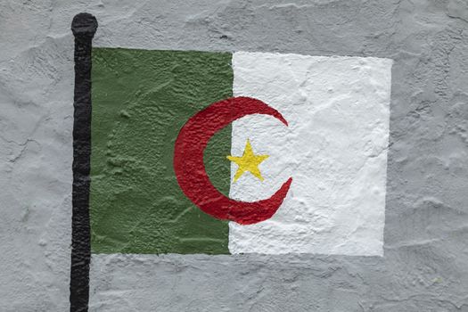 Childish style drawing, of the flag of Algeria, painted on a wall.