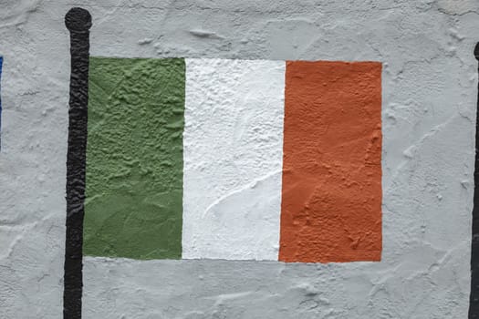 Childish style drawing, of the flag of Ireland, painted on a wall.