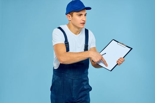 Delivery service man worker rendering service blue background. High quality photo