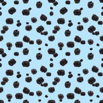 Falling Bramble Seamless pattern. Fresh Falling blackberry seamless pattern. Square pattern with fresh wild berries isolated on blue background. flat lay.