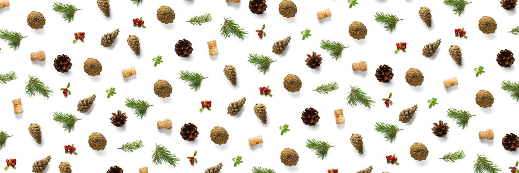 christmas background with pine cone, wine cork, pine twig and lingonberry. christmas background on white backdrop