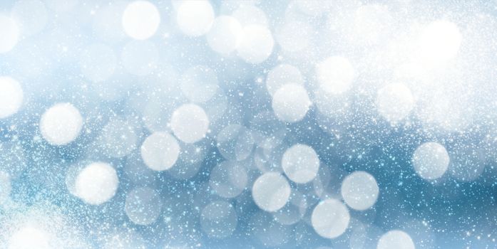 Sparkling Blue Magic Holiday Backdrop. Winter Snowflakes Blurred Background. Bright Shiny Celebration Template.